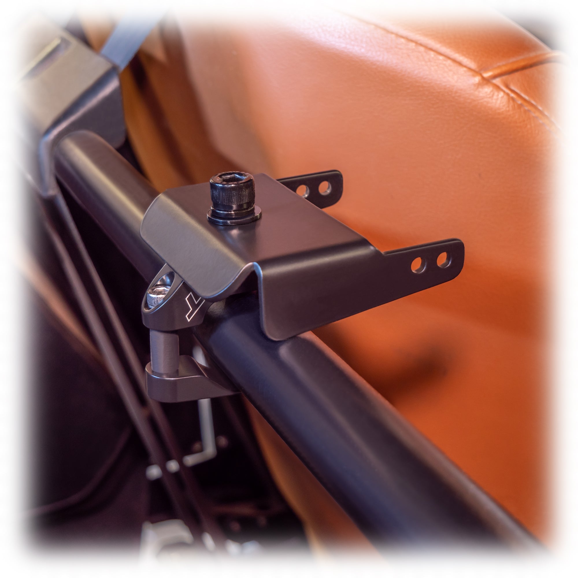 black powder-coated universal air pumper bracket on roll cage bar