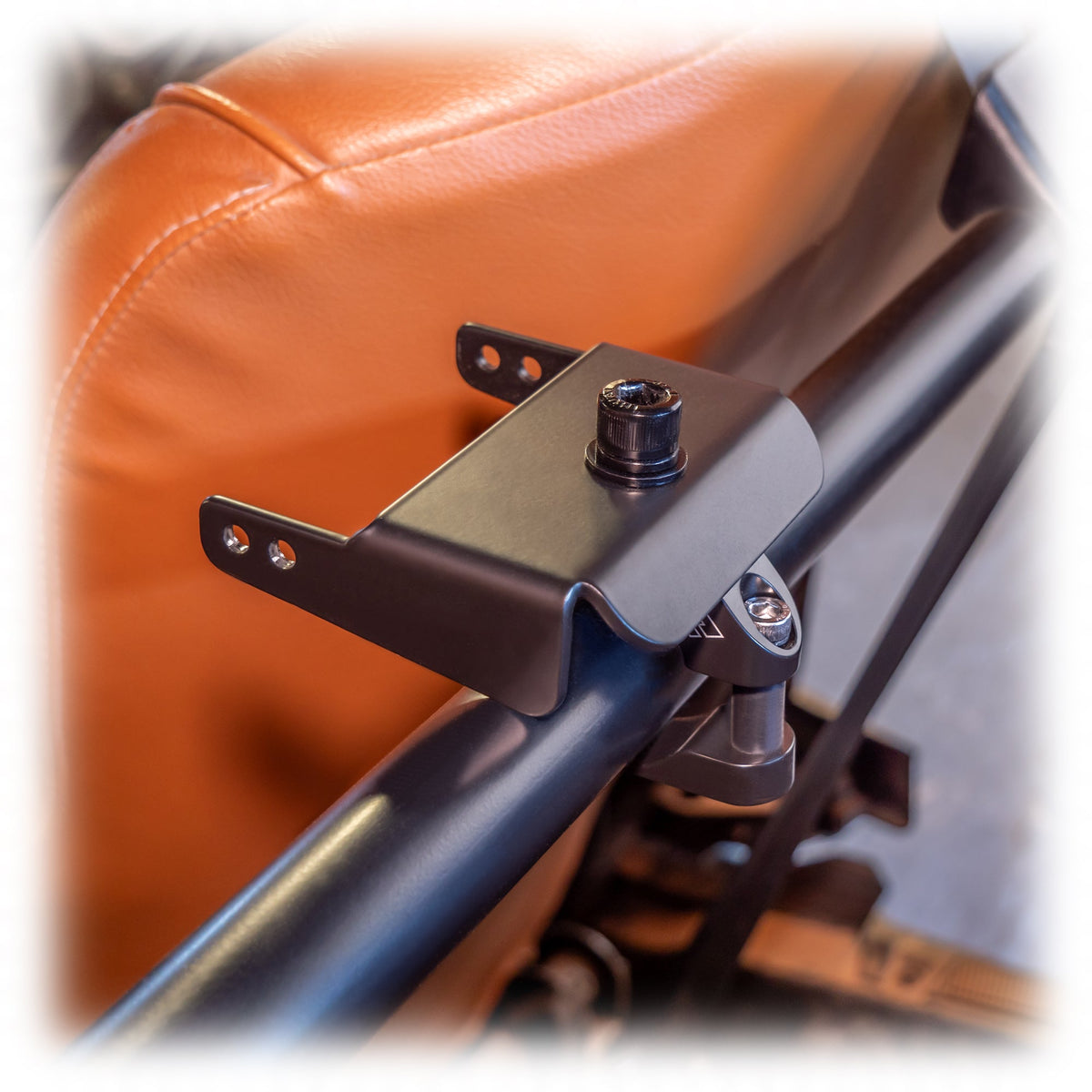 black powder-coated universal air pumper bracket on roll cage bar
