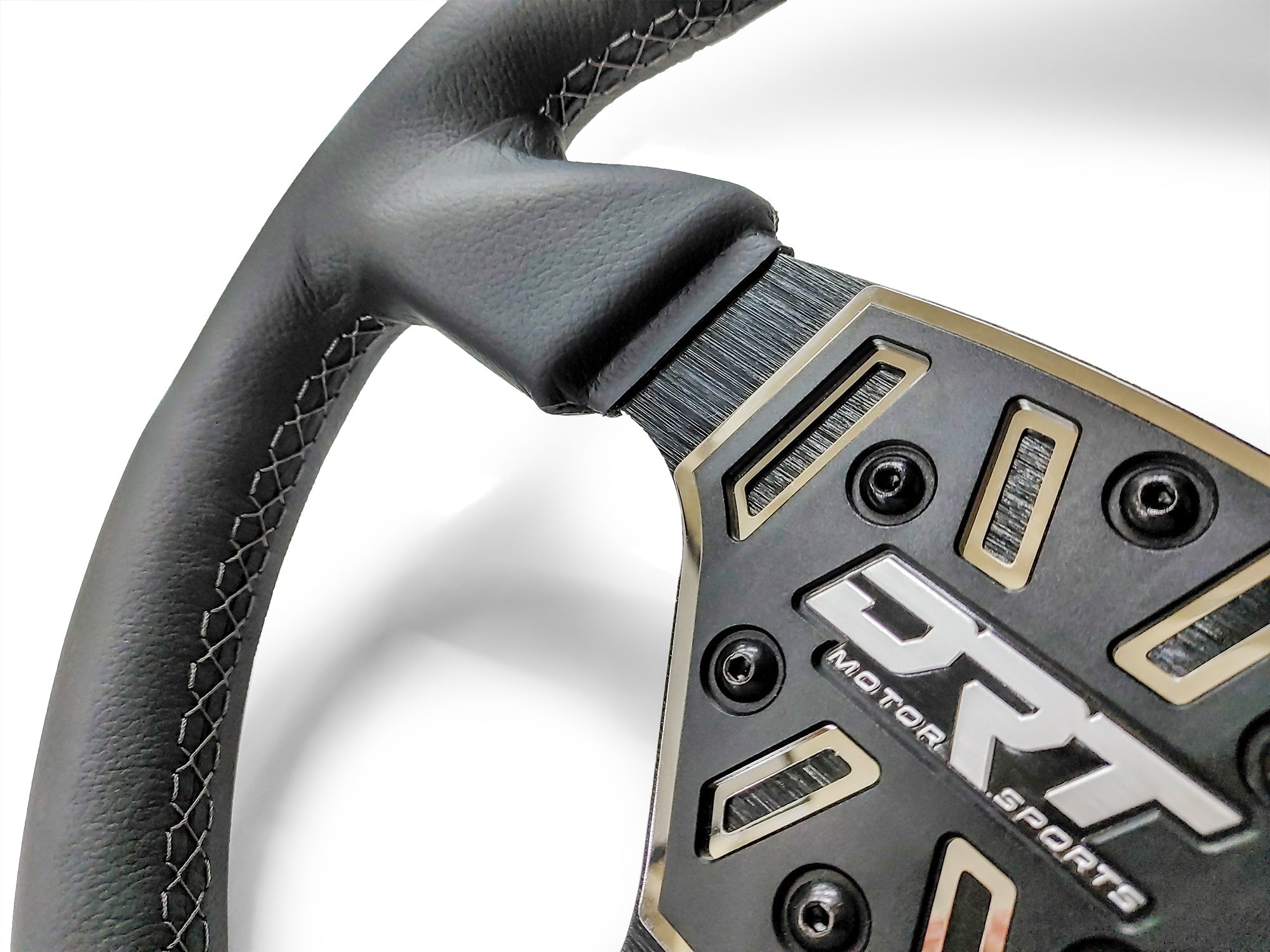 Details of a Round utv steering wheel in leather finish