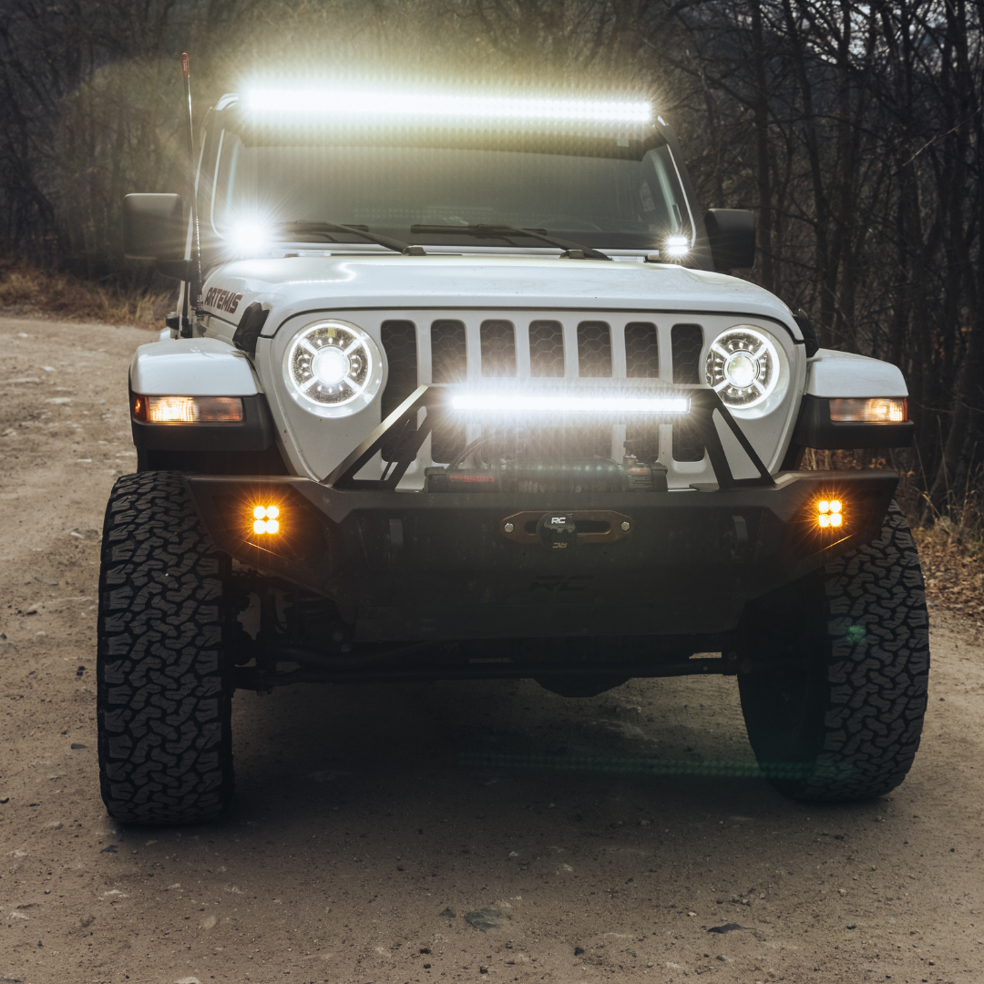 amber led fog light kit mounted on a jeep