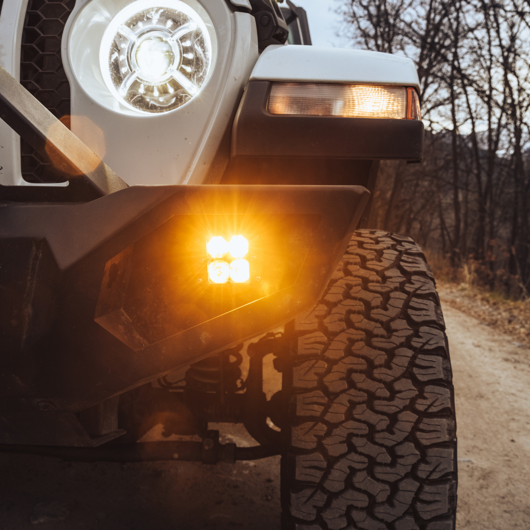 amber led fog light kit mounted on a jeep